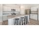 Modern kitchen with white cabinets and stainless steel appliances at 487 Pender Woods Dr, Summerville, SC 29486