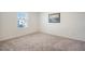Spacious bedroom with neutral carpet and a large window at 487 Pender Woods Dr, Summerville, SC 29486