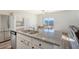 Kitchen island with granite countertop and double sink at 487 Pender Woods Dr, Summerville, SC 29486