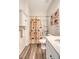 Bathroom with a shower/tub combo, white vanity, and wood-look floor at 487 Pender Woods Dr, Summerville, SC 29486