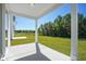 Covered patio with view of grassy backyard at 312 Chapman Cir, Goose Creek, SC 29445