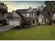 Two-story house with a landscaped lawn and attached garage at 2180 Tall Grass Cir, Mount Pleasant, SC 29466