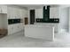 Spacious kitchen with white cabinets and green tile backsplash at 357 Wappoo Trace Ln, Summerville, SC 29486