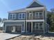 Two-story gray house with white accents and a balcony at 357 Wappoo Trace Ln, Summerville, SC 29486