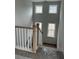 Modern staircase with wood railing and carpet runner at 357 Wappoo Trace Ln, Summerville, SC 29486