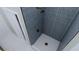 Modern bathroom with a walk-in shower and white subway tiles at 5209 Seewee Rd, Awendaw, SC 29429