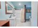 Modern bathroom with white vanity, subway tile shower, and a neutral color scheme at 2503 S Hwy 17A, Summerville, SC 29483