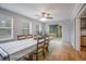 Bright dining room with table, chairs and backyard access at 2503 S Hwy 17A, Summerville, SC 29483