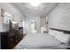 Spacious bedroom with wood floors, large bed, and an ensuite bathroom at 2503 S Hwy 17A, Summerville, SC 29483
