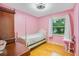 Charming bedroom with hardwood floors and a unique bed at 2503 S Hwy 17A, Summerville, SC 29483