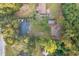 Aerial view showing the house, yard, and surrounding neighborhood at 2503 S Hwy 17A, Summerville, SC 29483