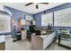 Bright home office featuring a large desk, ample storage, and natural light at 318 Simmons Ave, Summerville, SC 29483