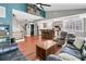 Open living area with hardwood floors, kitchen island, and a modern aesthetic at 318 Simmons Ave, Summerville, SC 29483