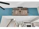 Reclaimed wood concealed TV lift in a stylish living room at 318 Simmons Ave, Summerville, SC 29483