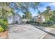 Two-car garage with driveway and a view of the backyard at 318 Simmons Ave, Summerville, SC 29483