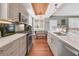 Modern kitchen with stainless steel appliances and white marble counters at 318 Simmons Ave, Summerville, SC 29483