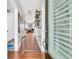 Bright entryway with hardwood floors and view into living room at 318 Simmons Ave, Summerville, SC 29483