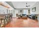 Open living area with hardwood floors, vaulted ceiling, and comfortable seating at 318 Simmons Ave, Summerville, SC 29483