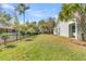 Spacious backyard with a grassy lawn and privacy fence at 318 Simmons Ave, Summerville, SC 29483