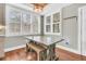 Farmhouse style dining area with wooden table and bench at 318 Simmons Ave, Summerville, SC 29483
