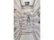 Large walk-in shower with gray tile, built-in shelves, and rainfall shower head at 318 Simmons Ave, Summerville, SC 29483