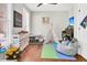 Playroom with toys, teepee, piano and colorful rug at 318 Simmons Ave, Summerville, SC 29483