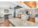 Living room with hardwood floors and a view of the kitchen and stairs at 318 Simmons Ave, Summerville, SC 29483