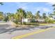 House exterior view with a palm tree and black fence at 318 Simmons Ave, Summerville, SC 29483