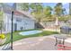 Backyard oasis with a pool, basketball court and artificial turf at 318 Simmons Ave, Summerville, SC 29483