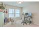 Bright home office with a workspace, hanging chair, and natural light at 215 Firewheel Ct, Summerville, SC 29486