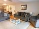 Living room features gray couches and a coffee table at 265 Sea Cloud Cir, Edisto Island, SC 29438