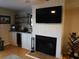 Living room with a fireplace and built-in shelving at 265 Sea Cloud Cir, Edisto Island, SC 29438