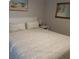 Guest bedroom with a full-size bed and neutral decor at 265 Sea Cloud Cir, Edisto Island, SC 29438
