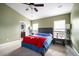 Spacious bedroom with carpeted floor and large window at 417 Crystal Oaks Ln, Moncks Corner, SC 29461