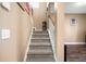 Carpeted staircase leading to the second floor at 417 Crystal Oaks Ln, Moncks Corner, SC 29461