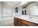 Bathroom boasts double vanity and a relaxing bathtub at 417 Crystal Oaks Ln, Moncks Corner, SC 29461