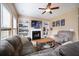 Comfortable living room featuring a fireplace and built-in shelving units at 417 Crystal Oaks Ln, Moncks Corner, SC 29461
