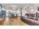 Open concept dining area with hardwood floors and view into kitchen at 219 Winding River Dr, Johns Island, SC 29455