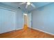 Spacious bedroom with wood floors, double closet and ceiling fan at 4505 Outwood Dr, Ladson, SC 29456