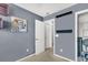 Bright bedroom with gray walls, white doors, and closet at 7928 Shadow Oak Dr, North Charleston, SC 29406