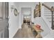 Bright and spacious entryway with hardwood floors and gallery wall at 239 Mcclellan Way, Summerville, SC 29483