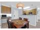 Dining area with a work space and view into the kitchen at 1755 Central Park Rd # 6109, Charleston, SC 29412