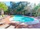 Inviting community pool with lounge chairs and brick deck at 1755 Central Park Rd # 6109, Charleston, SC 29412