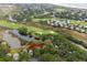 Aerial view showcasing a golf course and waterfront homes at 534 Cobby Creek Ln, Seabrook Island, SC 29455