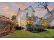 Backyard view of a charming two story house during sunset at 805 Tupelo Bay Dr, Mount Pleasant, SC 29464