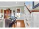 Elegant staircase with white railings and hardwood steps at 805 Tupelo Bay Dr, Mount Pleasant, SC 29464
