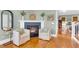 Cozy living space with a gas fireplace and comfortable armchairs at 805 Tupelo Bay Dr, Mount Pleasant, SC 29464
