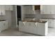Kitchen with white shaker cabinets and center island at 131 Ashley Cove Way, Summerville, SC 29483