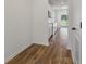 View down a hallway into a kitchen and dining area at 131 Ashley Cove Way, Summerville, SC 29483