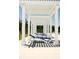 White pergola providing shade over lounge chairs by the pool at 353 Hillman Trail Dr, Moncks Corner, SC 29461